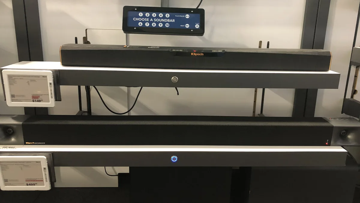 Home theater soundbar and speaker setup connected to a TV, related to fixing IPTV audio and video sync issues