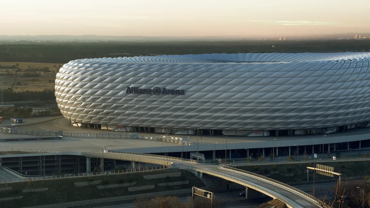 Photo by Richard Bartz, Munich aka Makro Freak, licensed under CC BY-SA 2.5 (Wikimedia Commons) Football stadium exterior on a clear day